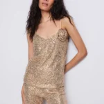 Rose gold αμάνικο τοπ παγιέτα με αποσπώμενη καρφίτσα λουλούδι